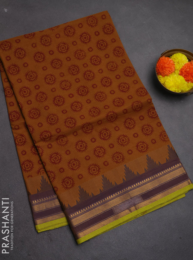 Chettinad cotton saree dark mustard and light green with allover butta prints and temple design zari woven border