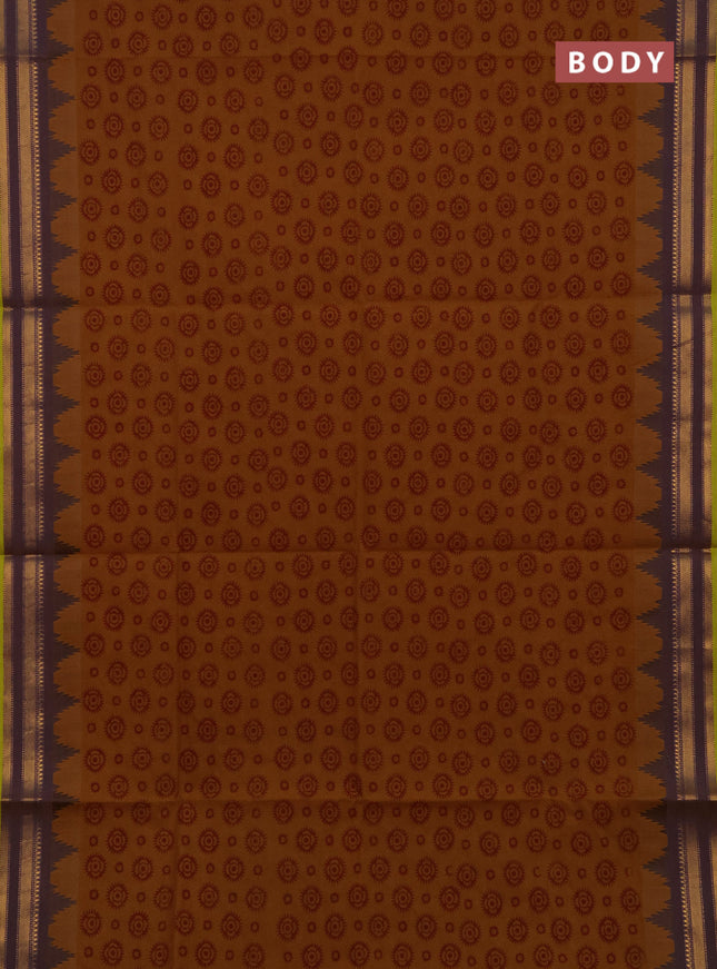 Chettinad cotton saree dark mustard and light green with allover butta prints and temple design zari woven border