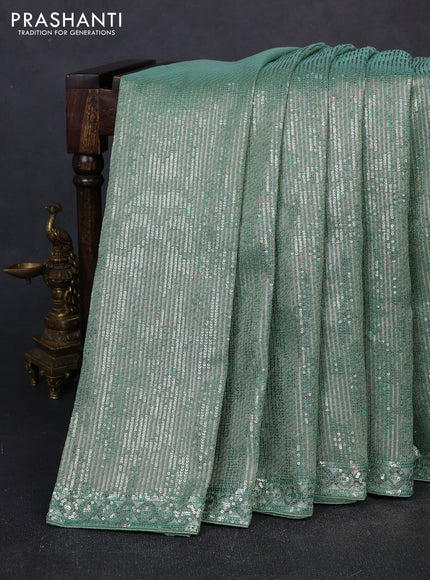 Organza Saree teal green with allover sequin embroidery work