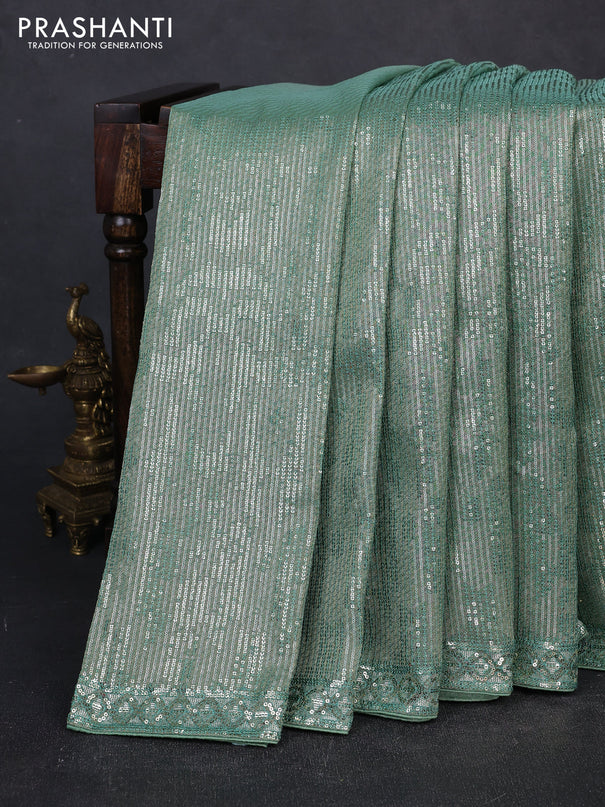 Organza Saree teal green with allover sequin embroidery work