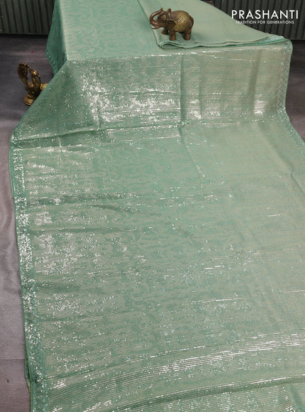 Organza Saree teal green with allover sequin embroidery work