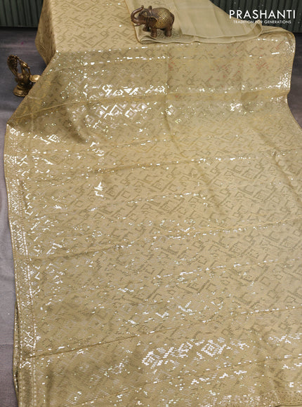 Banarasi Silk elaichi green with allover sequin embroidery work