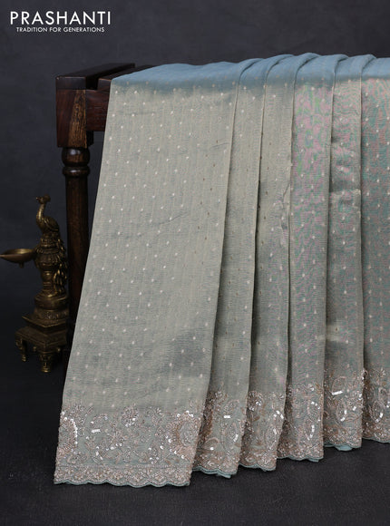 Crush Tissue Saree pastel blue shade with allover zari buttas and sequin & zardosi embroidery border
