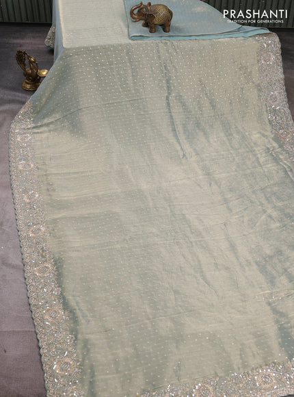 Crush Tissue Saree pastel blue shade with allover zari buttas and sequin & zardosi embroidery border