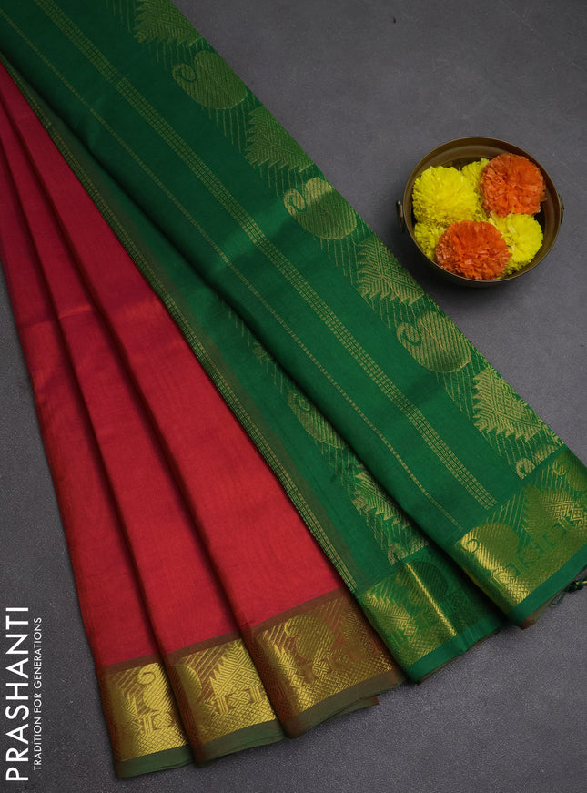 Silk cotton saree dual shade of pink and green with plain body and paisley & temple zari woven border