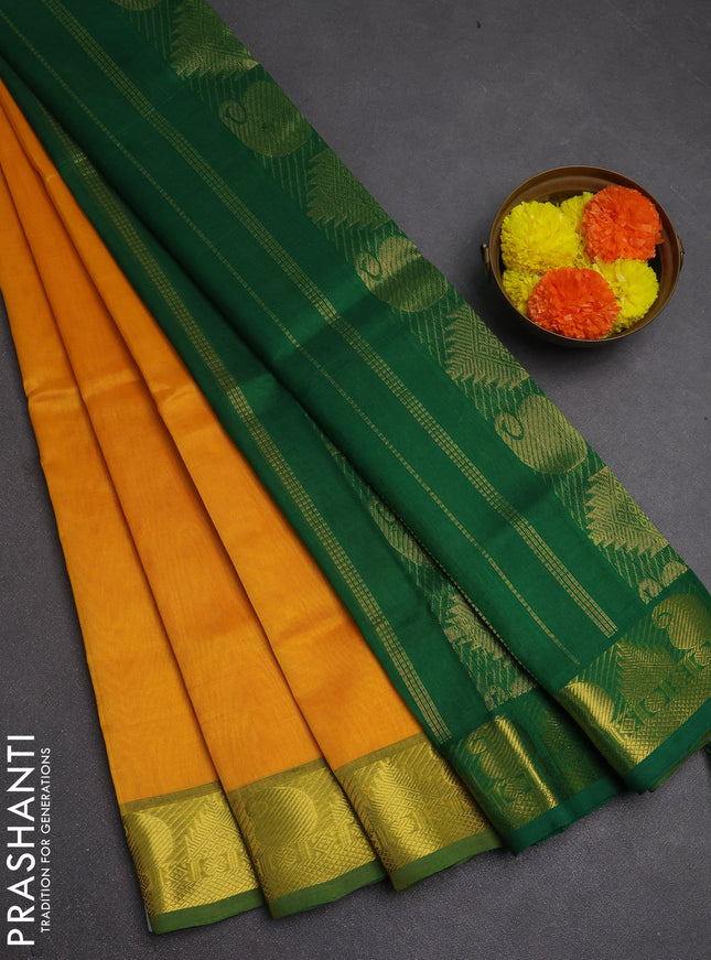 Silk cotton saree mango yellow and green with plain body and paisley & temple zari woven border