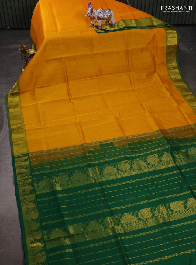 Silk cotton saree mango yellow and green with plain body and paisley & temple zari woven border