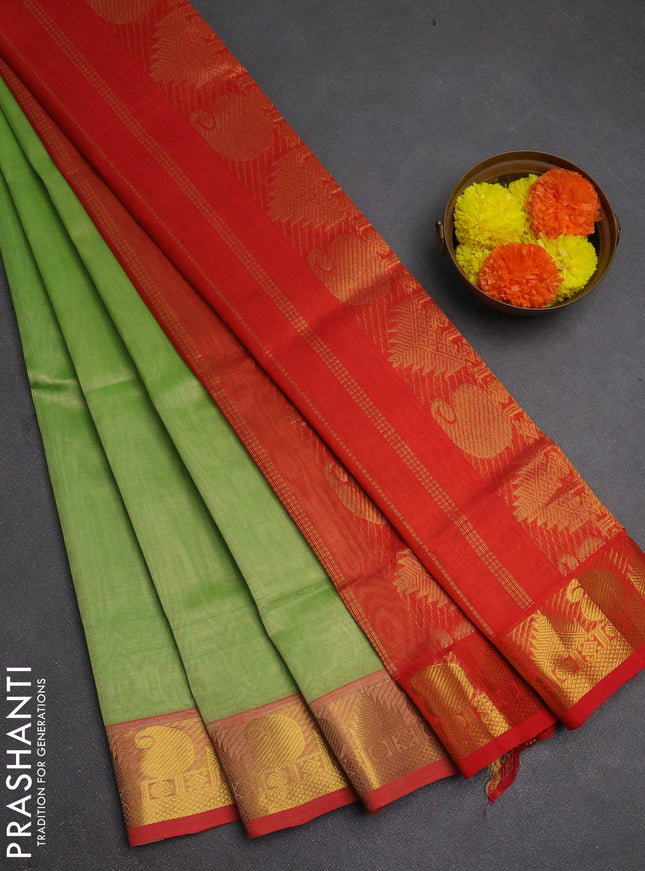 Silk cotton saree pista green and dual shade of orange with plain body and paisley & temple zari woven border