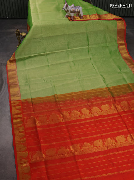 Silk cotton saree pista green and dual shade of orange with plain body and paisley & temple zari woven border