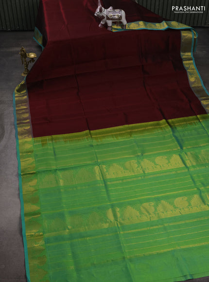 Silk cotton saree maroon and dual shade of green with plain body and paisley & temple zari woven border