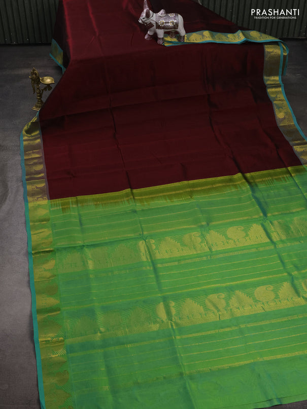 Silk cotton saree maroon and dual shade of green with plain body and paisley & temple zari woven border