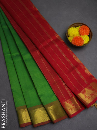 Silk cotton saree green and maroon with plain body and paisley & temple zari woven border