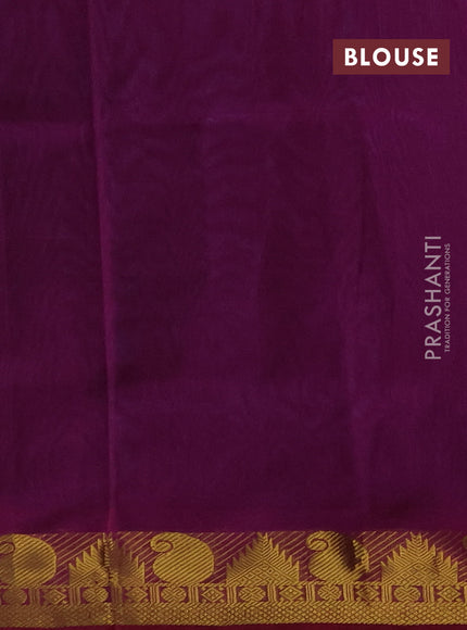 Silk cotton saree dual shade of teal blue and purple with plain body and paisley & temple zari woven border