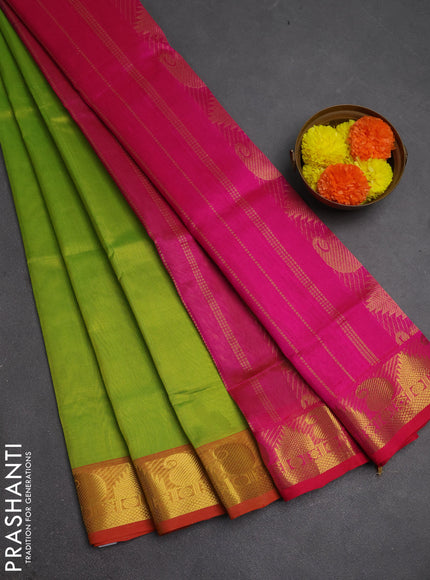 Silk cotton saree light green and pink with plain body and paisley & temple zari woven border