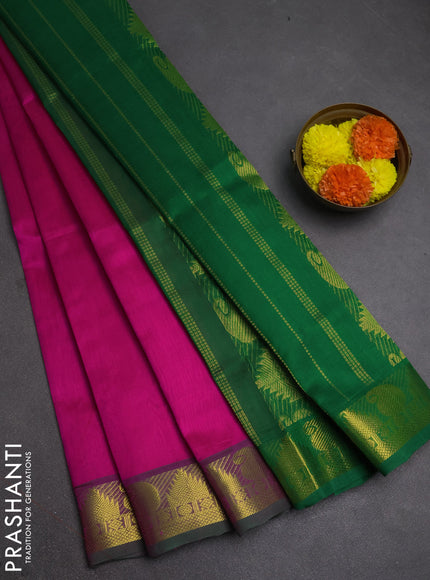 Silk cotton saree pink and green with plain body and paisley & temple zari woven border