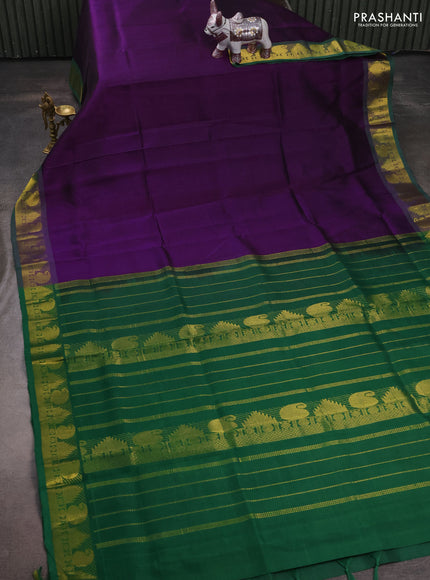 Silk cotton saree purple and green with plain body and paisley & temple zari woven border