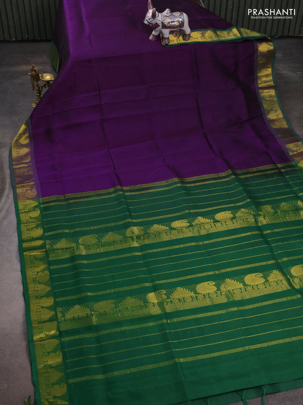 Silk cotton saree purple and green with plain body and paisley & temple zari woven border