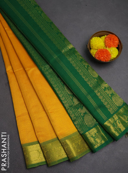 Silk cotton saree mango yellow and green with plain body and annam zari woven border