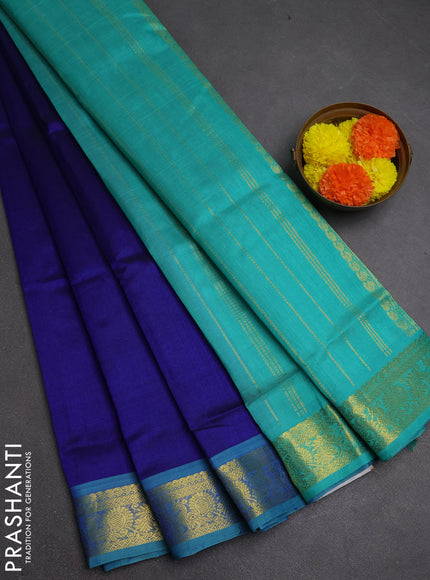 Silk cotton saree blue and teal green shade with plain body and annam zari woven border