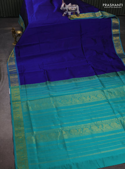 Silk cotton saree blue and teal green shade with plain body and annam zari woven border