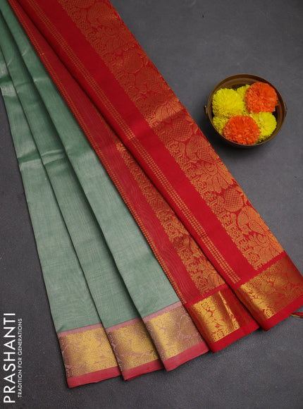Silk cotton saree pastel green and red with plain body and peacock zari woven border