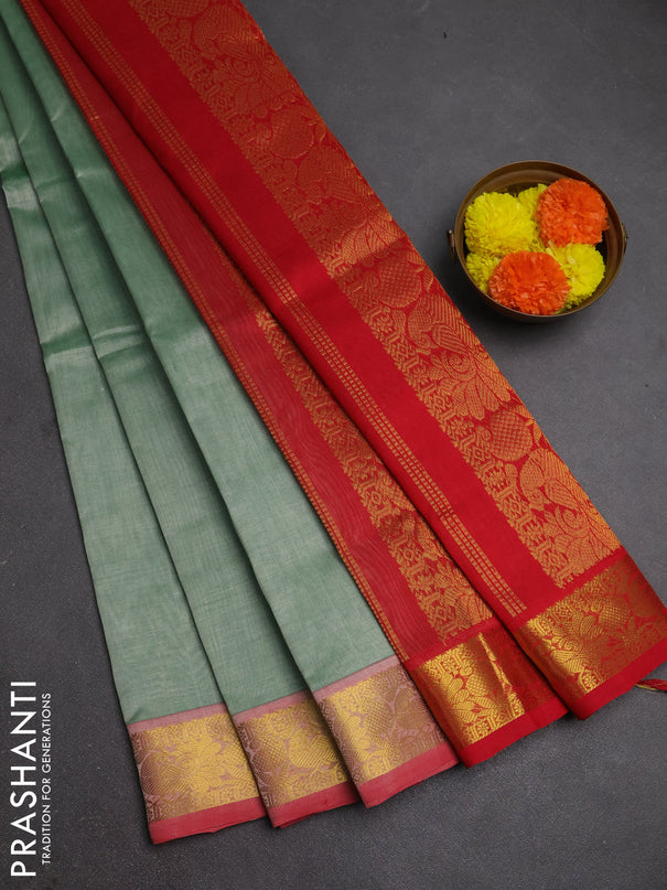 Silk cotton saree pastel green and red with plain body and peacock zari woven border