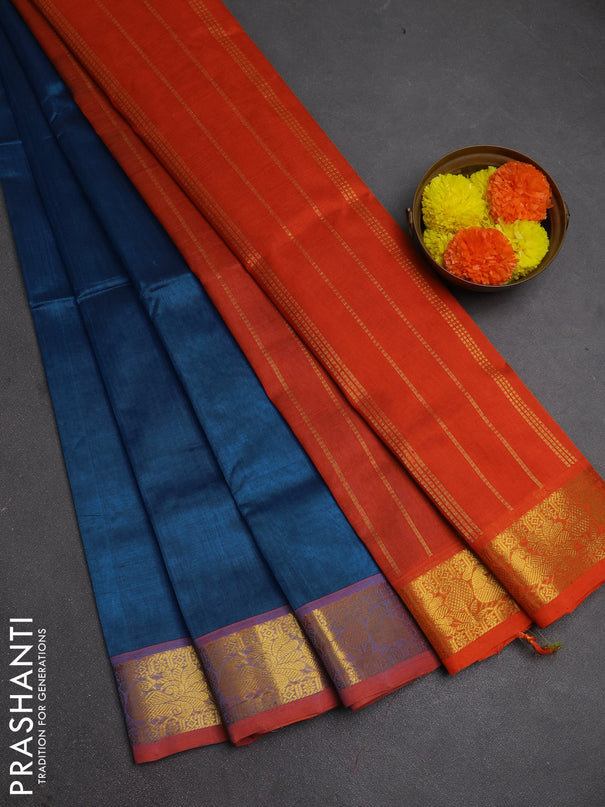 Silk cotton saree cs blue and orange with plain body and peacock zari woven border
