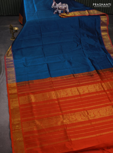 Silk cotton saree cs blue and orange with plain body and peacock zari woven border