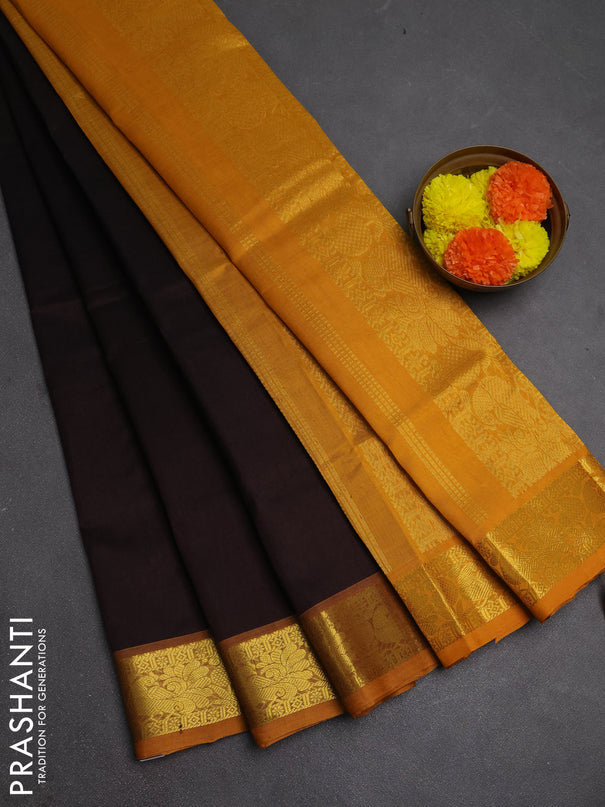 Silk cotton saree coffee brown and mustard yellow with plain body and peacock zari woven border