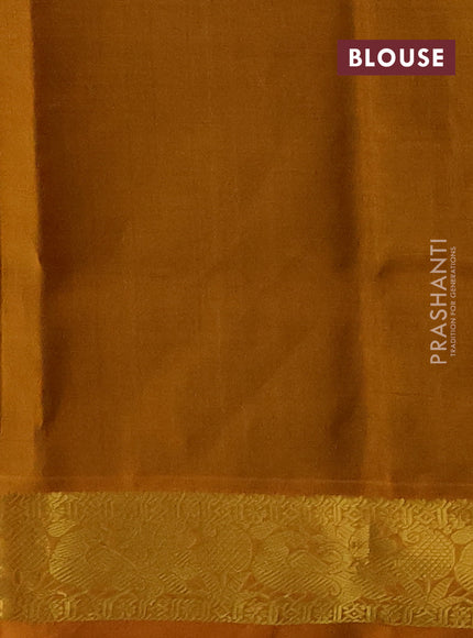 Silk cotton saree coffee brown and mustard yellow with plain body and peacock zari woven border