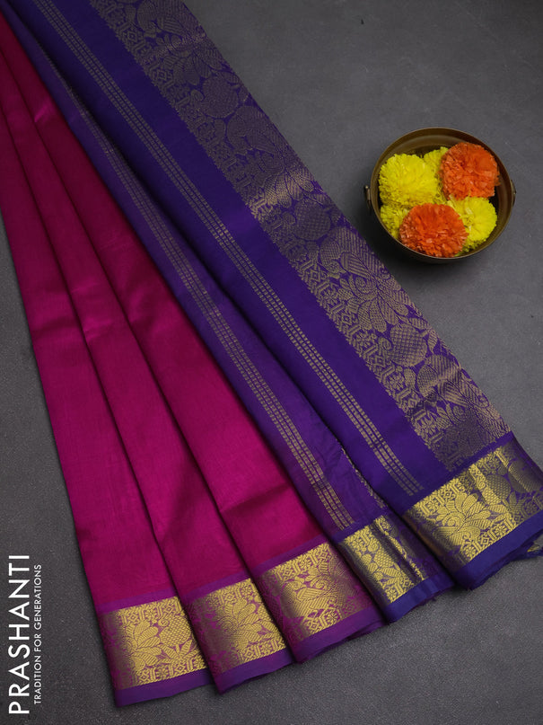 Silk cotton saree magenta pink and violet with plain body and peacock zari woven border