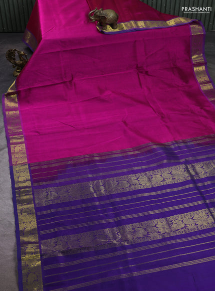 Silk cotton saree magenta pink and violet with plain body and peacock zari woven border