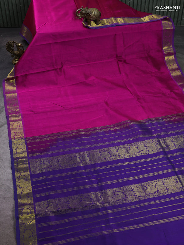 Silk cotton saree magenta pink and violet with plain body and peacock zari woven border