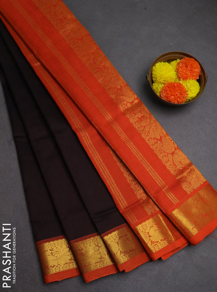 Silk cotton saree coffee brown and orange with plain body and peacock zari woven border