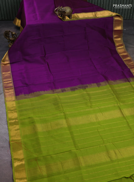 Silk cotton saree purple and light green with plain body and zari woven border