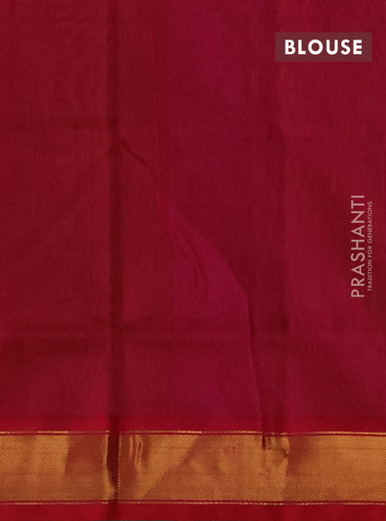 Silk cotton saree mustard green shade and pink with plain body and zari woven border