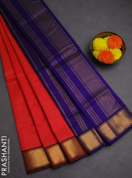 Silk cotton saree dual shade of pinkish orange and blue with plain body and zari woven border
