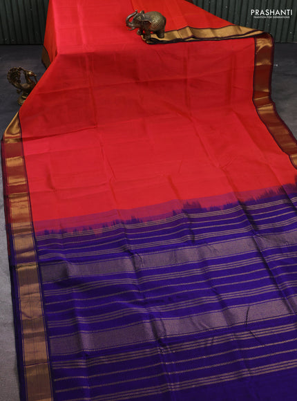 Silk cotton saree dual shade of pinkish orange and blue with plain body and zari woven border