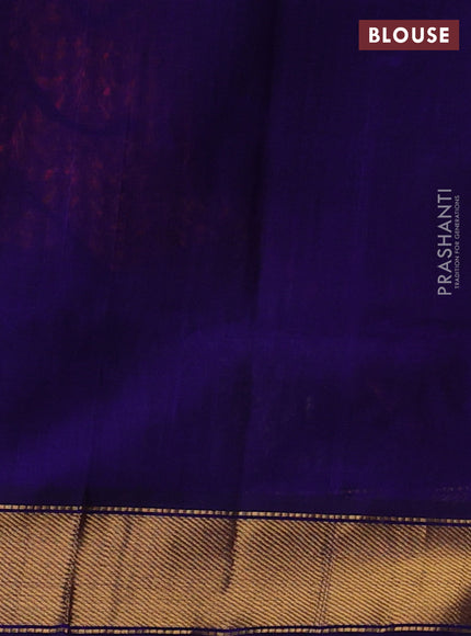 Silk cotton saree dual shade of pinkish orange and blue with plain body and zari woven border