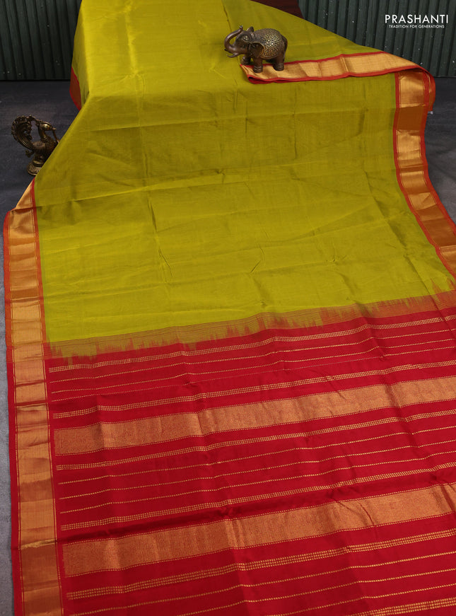 Silk cotton saree mustard green shade and red with plain body and zari woven border