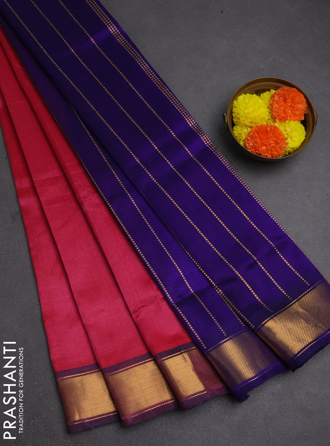 Silk cotton saree pink and violet with plain body and zari woven border