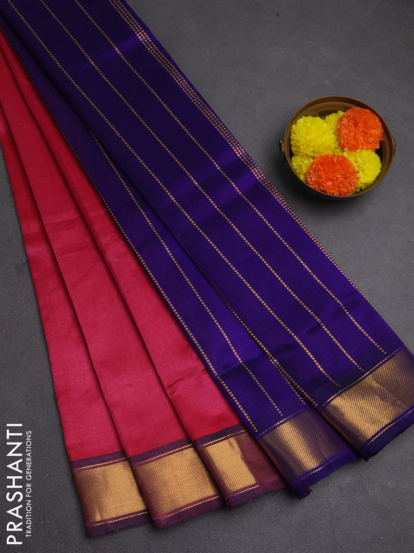 Silk cotton saree pink and violet with plain body and zari woven border