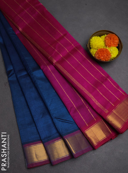 Silk cotton saree peacock blue and pink with plain body and zari woven border
