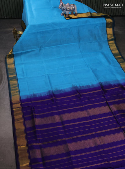 Silk cotton saree light blue and blue with plain body and zari woven border