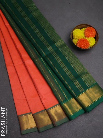 Silk cotton saree peach orange and green with plain body and zari woven border