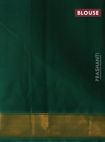 Silk cotton saree peach orange and green with plain body and zari woven border