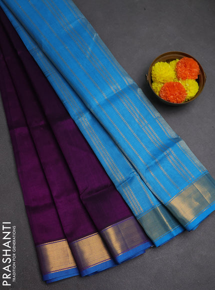 Silk cotton saree purple and cs blue with plain body and zari woven border