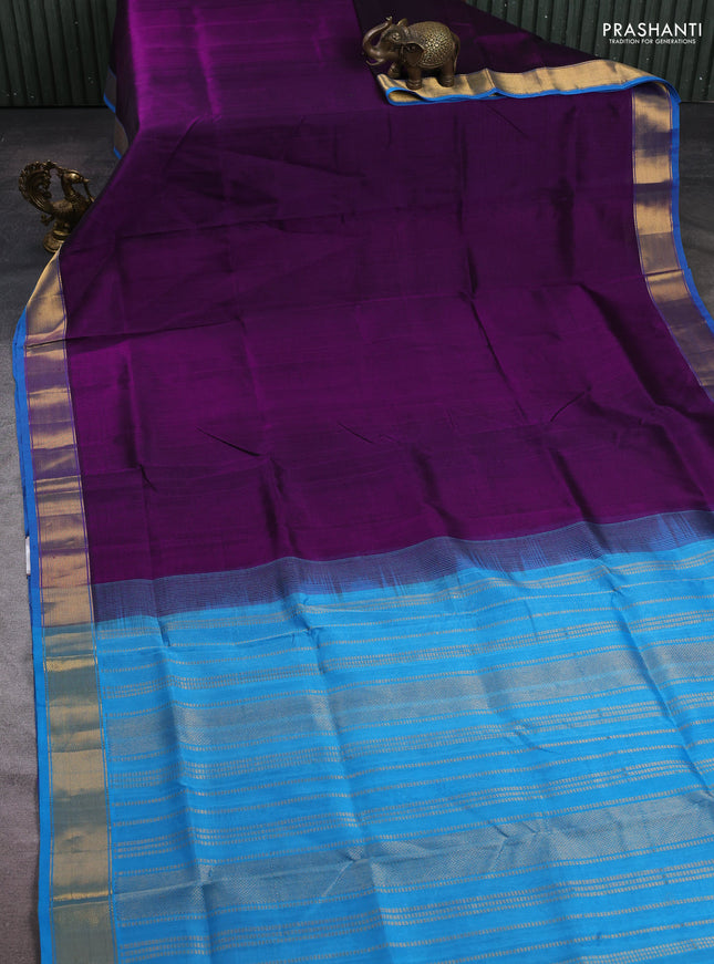 Silk cotton saree purple and cs blue with plain body and zari woven border