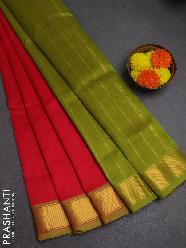 Silk cotton saree tomato pink and light green with plain body and zari woven border