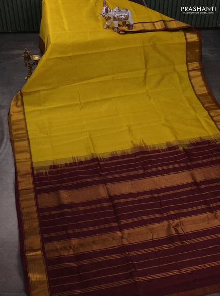 Silk cotton saree lime yellow and wine shade with plain body and zari woven border